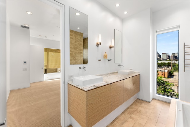 1505 N Haskell Ave Unit 5, Dallas, TX 75204 - full bathroom with double vanity and recessed lighting