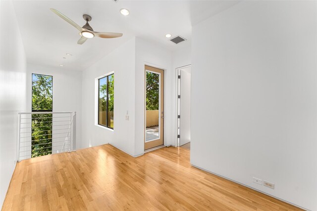 1505 N Haskell Ave Unit 5, Dallas, TX 75204 - unfurnished room with wood finished floors, ceiling fan, and recessed lighting