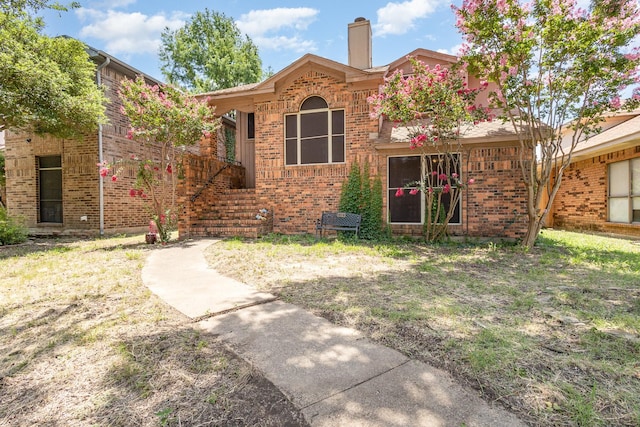 1740 Alameda Dr, Mesquite, TX 75150 - view of front of property featuring a chimney and brick siding