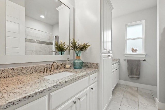2941 American Sparrow Dr, Midlothian, TX 76065 - bathroom with vanity and tiled shower