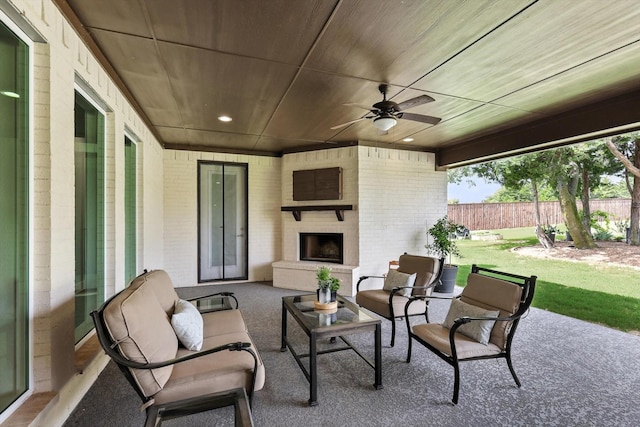 2941 American Sparrow Dr, Midlothian, TX 76065 - view of patio featuring a large fireplace and a ceiling fan