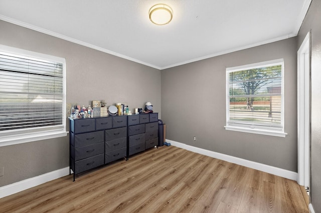 2549 Vickie St, Mesquite, TX 75149 - bedroom with light wood-type flooring and ornamental molding