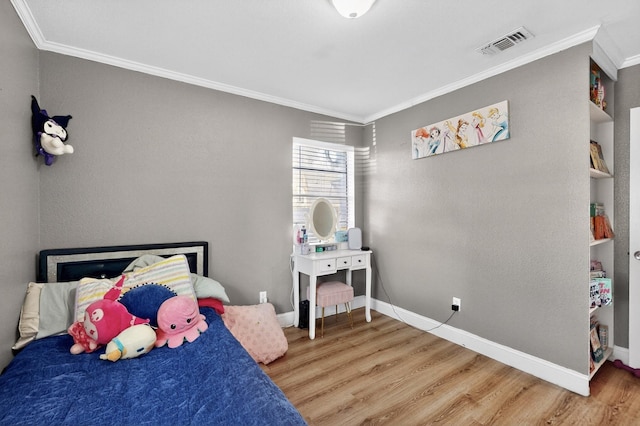 2549 Vickie St, Mesquite, TX 75149 - bedroom featuring crown molding and wood finished floors