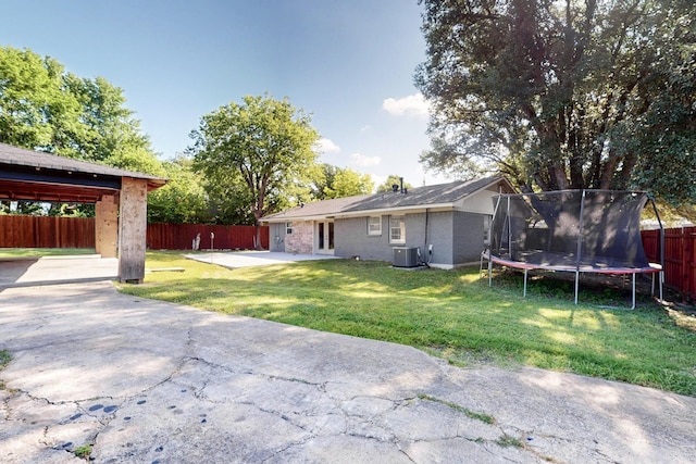 2549 Vickie St, Mesquite, TX 75149 - view of yard featuring a trampoline and a patio
