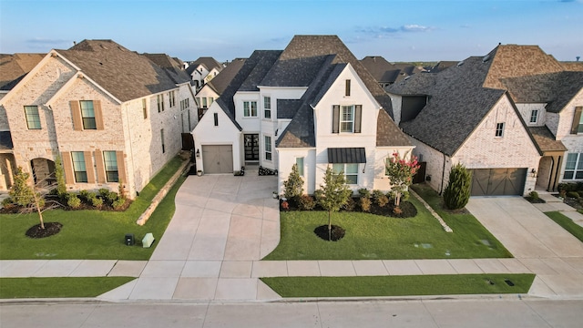 2217 Grey September St, Celina, TX 75009 - french provincial home featuring driveway, a garage, a residential view, and a shingled roof