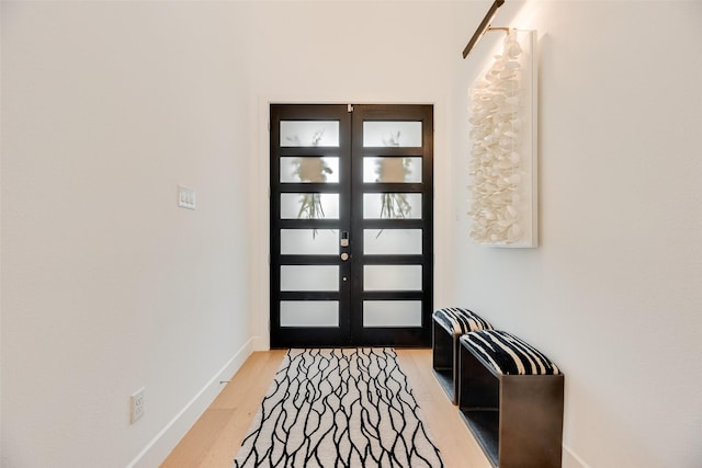 2217 Grey September St, Celina, TX 75009 - foyer entrance with light wood-type flooring and french doors