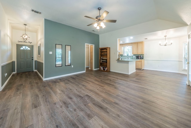 1405 Scotland Ave, Azle, TX 76020 - unfurnished living room featuring a chandelier, dark wood-style flooring, a ceiling fan, and lofted ceiling