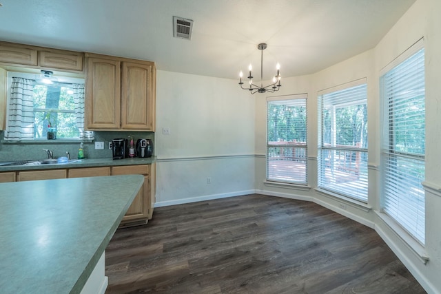 1405 Scotland Ave, Azle, TX 76020 - kitchen featuring a chandelier, light brown cabinetry, dark wood finished floors, decorative light fixtures, and light countertops