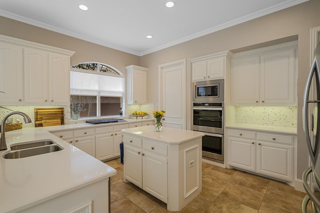 504 Rainforest Ln, Allen, TX 75013 - kitchen featuring stainless steel appliances, decorative backsplash, recessed lighting, white cabinetry, and a kitchen island