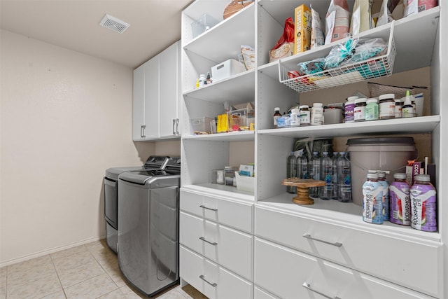 1524 Quails Nest Dr, Fort Worth, TX 76177 - laundry area with separate washer and dryer and light tile patterned flooring