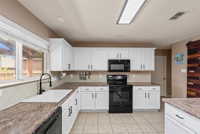 1524 Quails Nest Dr, Fort Worth, TX 76177 - kitchen with black appliances, backsplash, white cabinetry, light tile patterned floors, and light stone countertops
