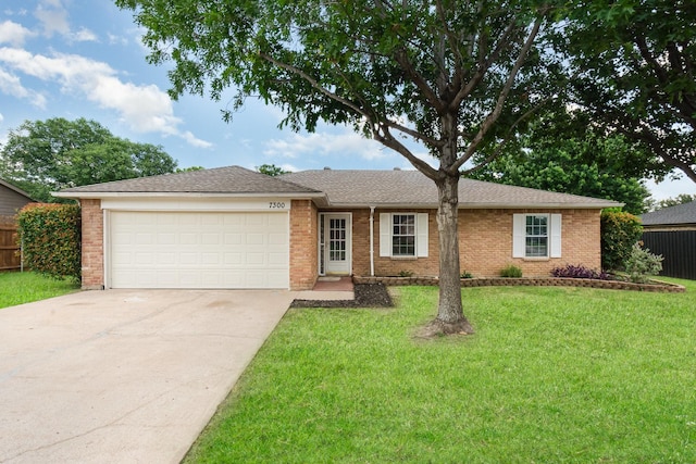 7300 Windhaven Rd, North Richland Hills, TX 76182 - ranch-style home with driveway, brick siding, and a garage
