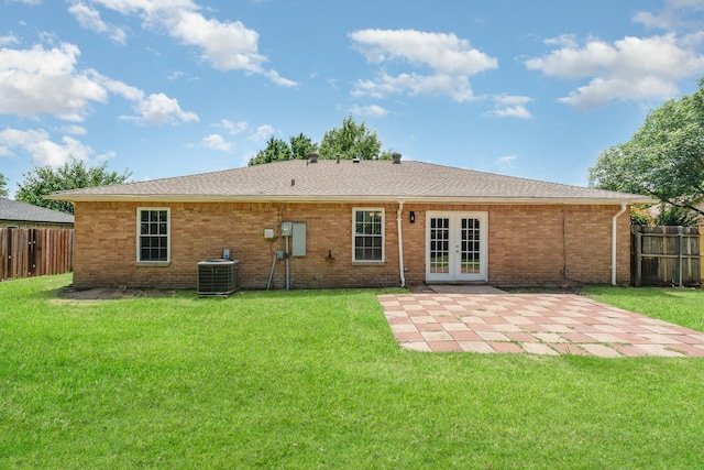 7300 Windhaven Rd, North Richland Hills, TX 76182 - rear view of house with french doors, a patio area, and brick siding