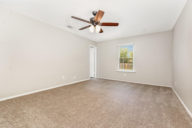 7300 Windhaven Rd, North Richland Hills, TX 76182 - carpeted empty room with ceiling fan and a textured ceiling