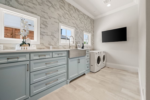 2009 Wheeler Dr, Southlake, TX 76092 - laundry area with independent washer and dryer, crown molding, and cabinet space