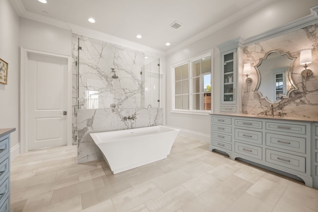 2009 Wheeler Dr, Southlake, TX 76092 - bathroom with vanity, a soaking tub, a marble finish shower, recessed lighting, and crown molding