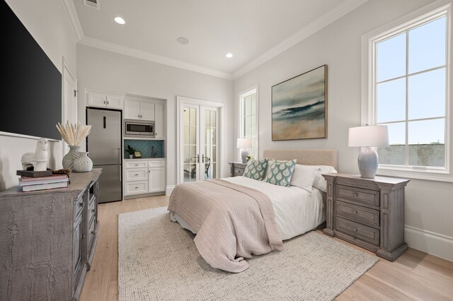 2009 Wheeler Dr, Southlake, TX 76092 - bedroom with stainless steel fridge, ornamental molding, light wood finished floors, and recessed lighting