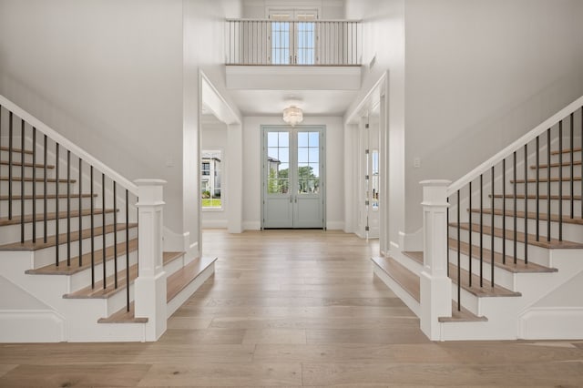2009 Wheeler Dr, Southlake, TX 76092 - foyer with stairs, wood finished floors, and a high ceiling