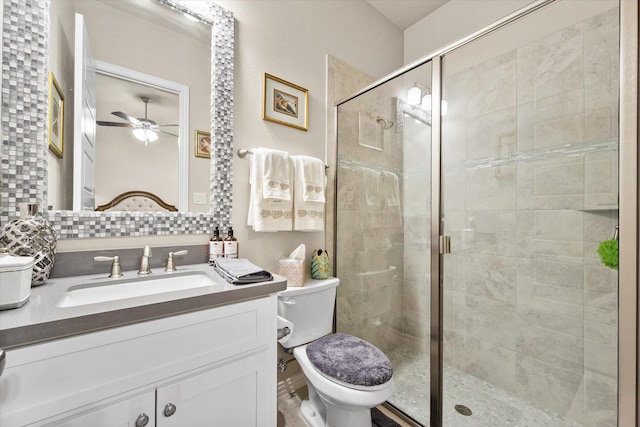 10874 Smoky Oak Trl, Flower Mound, TX 76226 - full bathroom featuring a shower stall, vanity, a ceiling fan, and tasteful backsplash