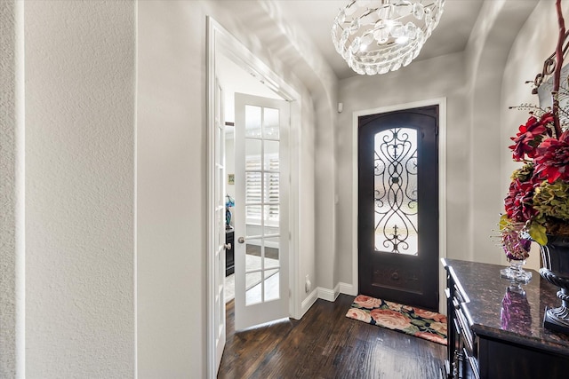 10874 Smoky Oak Trl, Flower Mound, TX 76226 - foyer with dark wood-style flooring and a chandelier