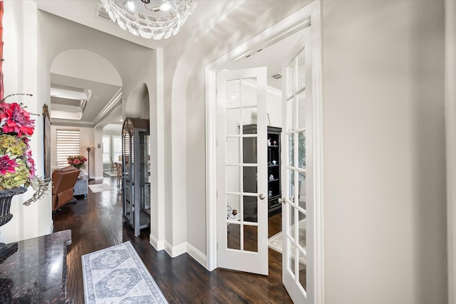 10874 Smoky Oak Trl, Flower Mound, TX 76226 - entryway with arched walkways, dark wood-style flooring, french doors, and a chandelier