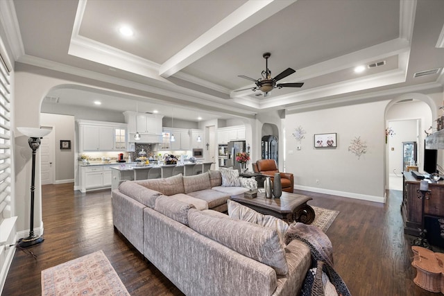 10874 Smoky Oak Trl, Flower Mound, TX 76226 - living room featuring arched walkways, a ceiling fan, crown molding, dark wood-style flooring, and recessed lighting