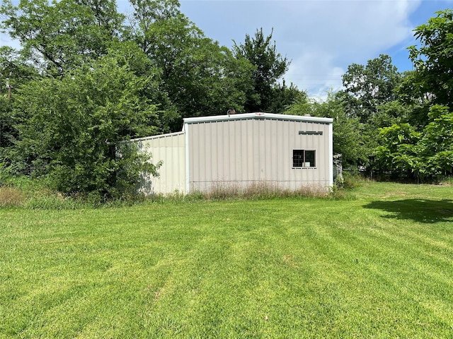 603 E Thomas St, Sherman, TX 75090 - view of green lawn with an outbuilding