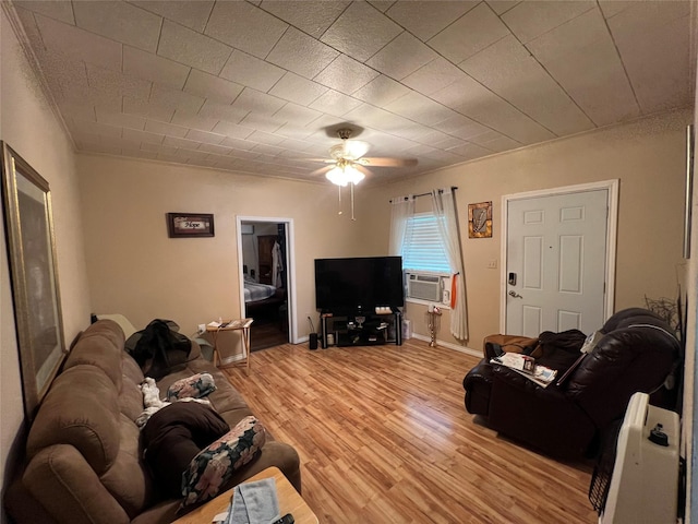 603 E Thomas St, Sherman, TX 75090 - living room with cooling unit, crown molding, a ceiling fan, and light wood-style floors