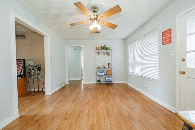 514 Fairview Dr, Richardson, TX 75081 - spare room featuring light wood-style flooring and a ceiling fan