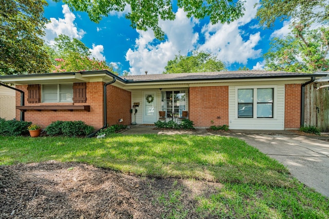 514 Fairview Dr, Richardson, TX 75081 - single story home with brick siding and a front lawn