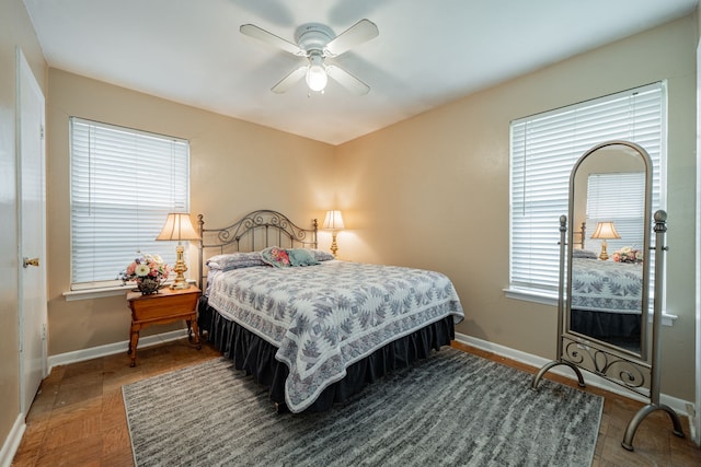 514 Fairview Dr, Richardson, TX 75081 - bedroom featuring multiple windows and a ceiling fan