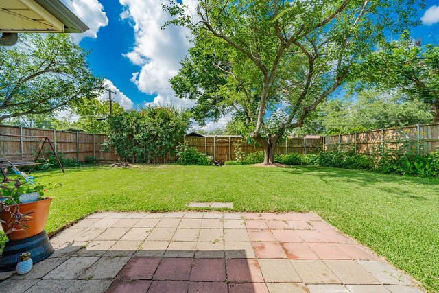 514 Fairview Dr, Richardson, TX 75081 - fenced backyard with a patio area