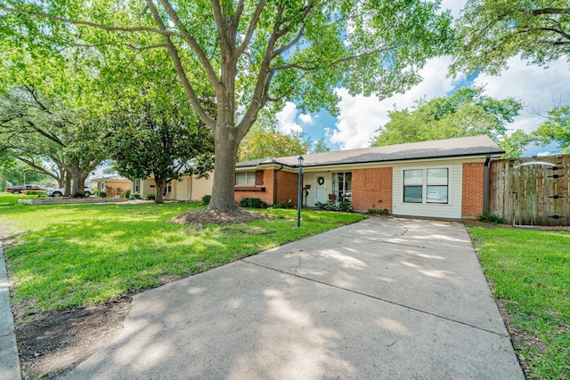 514 Fairview Dr, Richardson, TX 75081 - ranch-style house with brick siding and concrete driveway