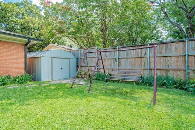 514 Fairview Dr, Richardson, TX 75081 - view of yard with a storage unit