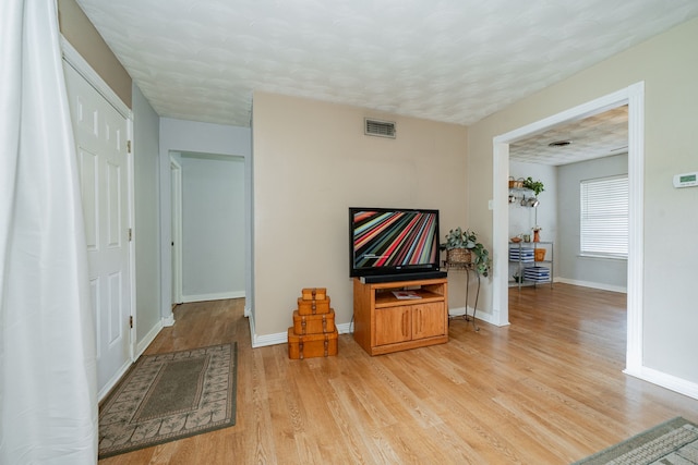 514 Fairview Dr, Richardson, TX 75081 - hallway featuring light wood-style flooring and baseboards