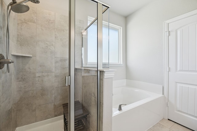 1001 Boulder Rd, Weatherford, TX 76085 - bathroom featuring a stall shower, a garden tub, and tile patterned flooring
