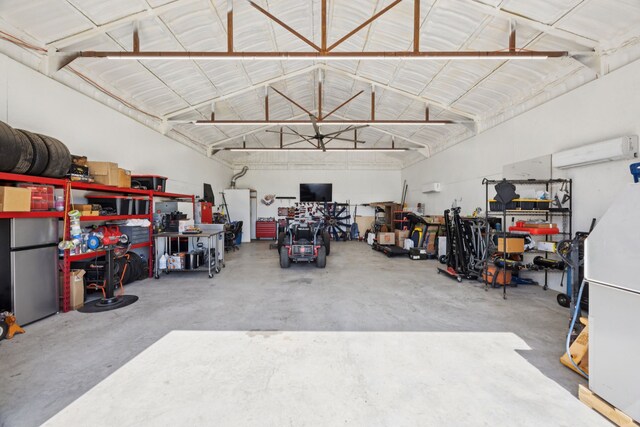 1001 Boulder Rd, Weatherford, TX 76085 - garage featuring a workshop area and an AC wall unit