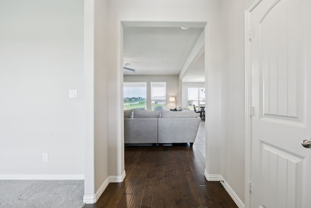 1001 Boulder Rd, Weatherford, TX 76085 - corridor with dark wood-type flooring and baseboards