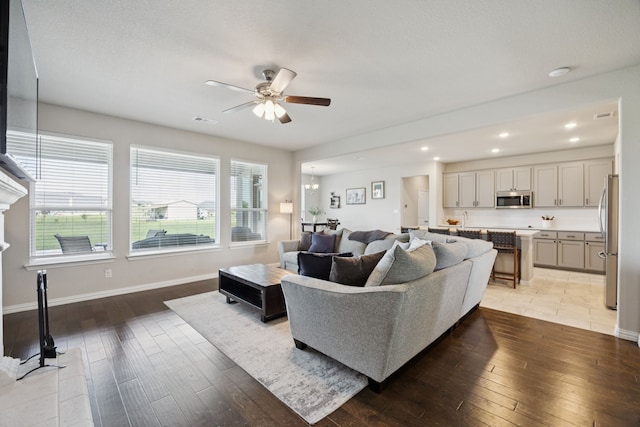 1001 Boulder Rd, Weatherford, TX 76085 - living area featuring ceiling fan, light wood finished floors, and recessed lighting