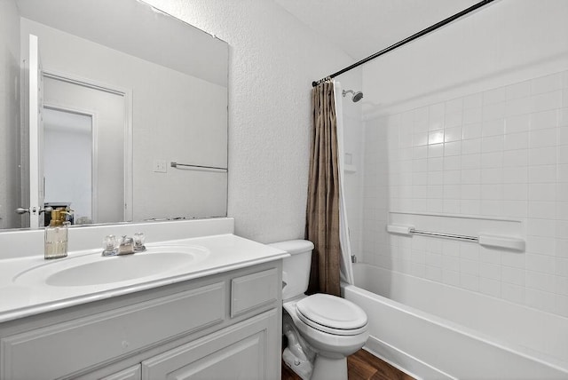 1245 Mountain Peak Dr, Fort Worth, TX 76052 - bathroom featuring vanity, shower / bath combo with shower curtain, wood finished floors, and a textured wall