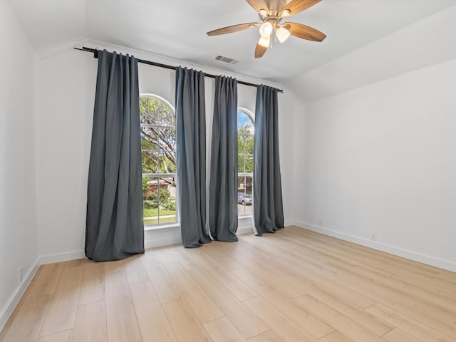 11342 Raveneaux Dr, Frisco, TX 75033 - unfurnished room featuring lofted ceiling, wood finished floors, and ceiling fan