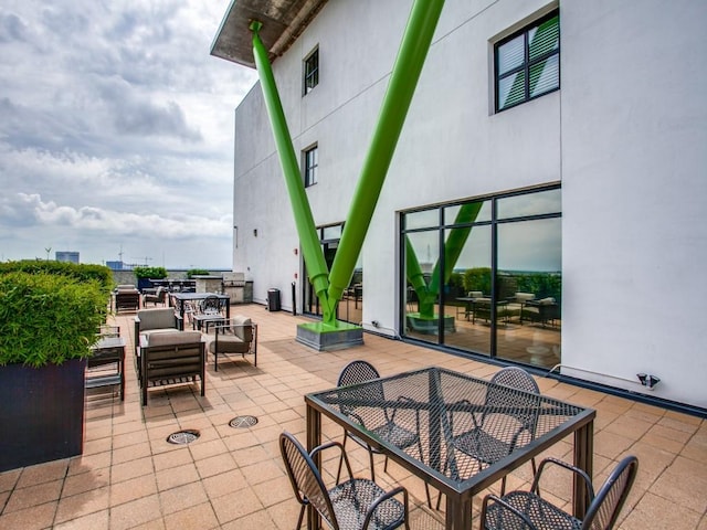 3110 Thomas Ave Unit 101, Dallas, TX 75204 - view of patio with outdoor dining space
