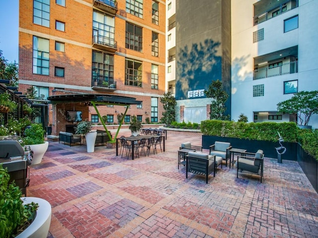 3110 Thomas Ave Unit 101, Dallas, TX 75204 - view of patio featuring an outdoor hangout area and a grill