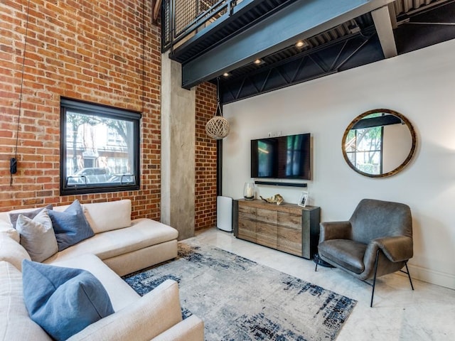 3110 Thomas Ave Unit 101, Dallas, TX 75204 - living room with healthy amount of natural light, marble look tile flooring, brick wall, and beamed ceiling