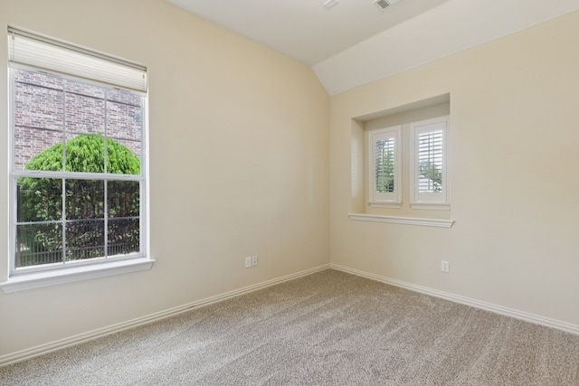 6802 Westfield Ct, Arlington, TX 76001 - unfurnished room with healthy amount of natural light, carpet floors, and vaulted ceiling