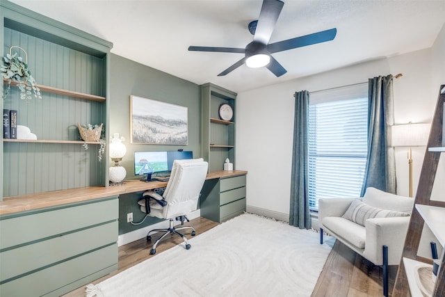 726 W Crossland Blvd, Grand Prairie, TX 75052 - office area featuring built in study area, ceiling fan, and wood finished floors