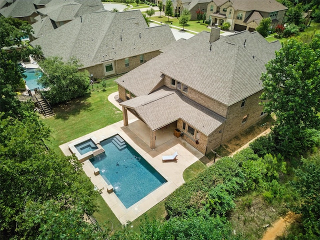 9601 Blackpine Ct, Argyle, TX 76226 - aerial perspective of suburban area featuring a pool area