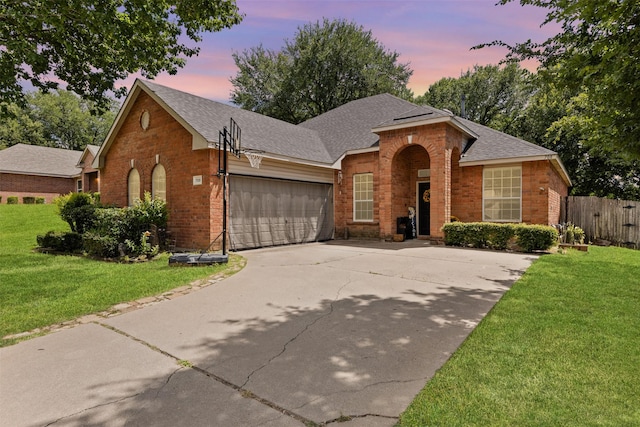 708 Hummingbird Trl, Crowley, TX 76036 - view of front of house with brick siding, concrete driveway, a garage, and a shingled roof
