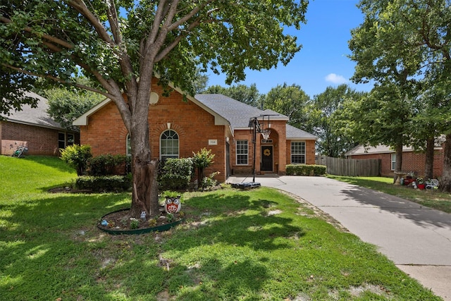 708 Hummingbird Trl, Crowley, TX 76036 - view of front of house with brick siding and driveway