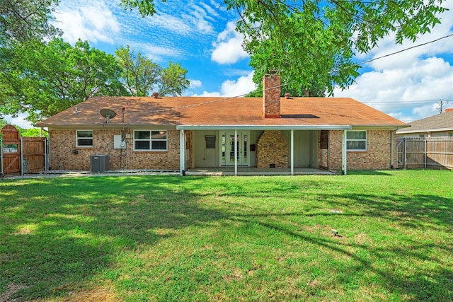 8441 Main St, North Richland Hills, TX 76182 - back of house with a chimney, a fenced backyard, a gate, a patio area, and brick siding